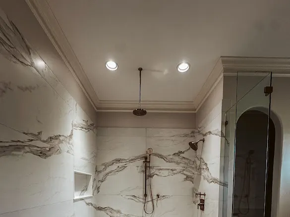 Marble shower, oiled bronze