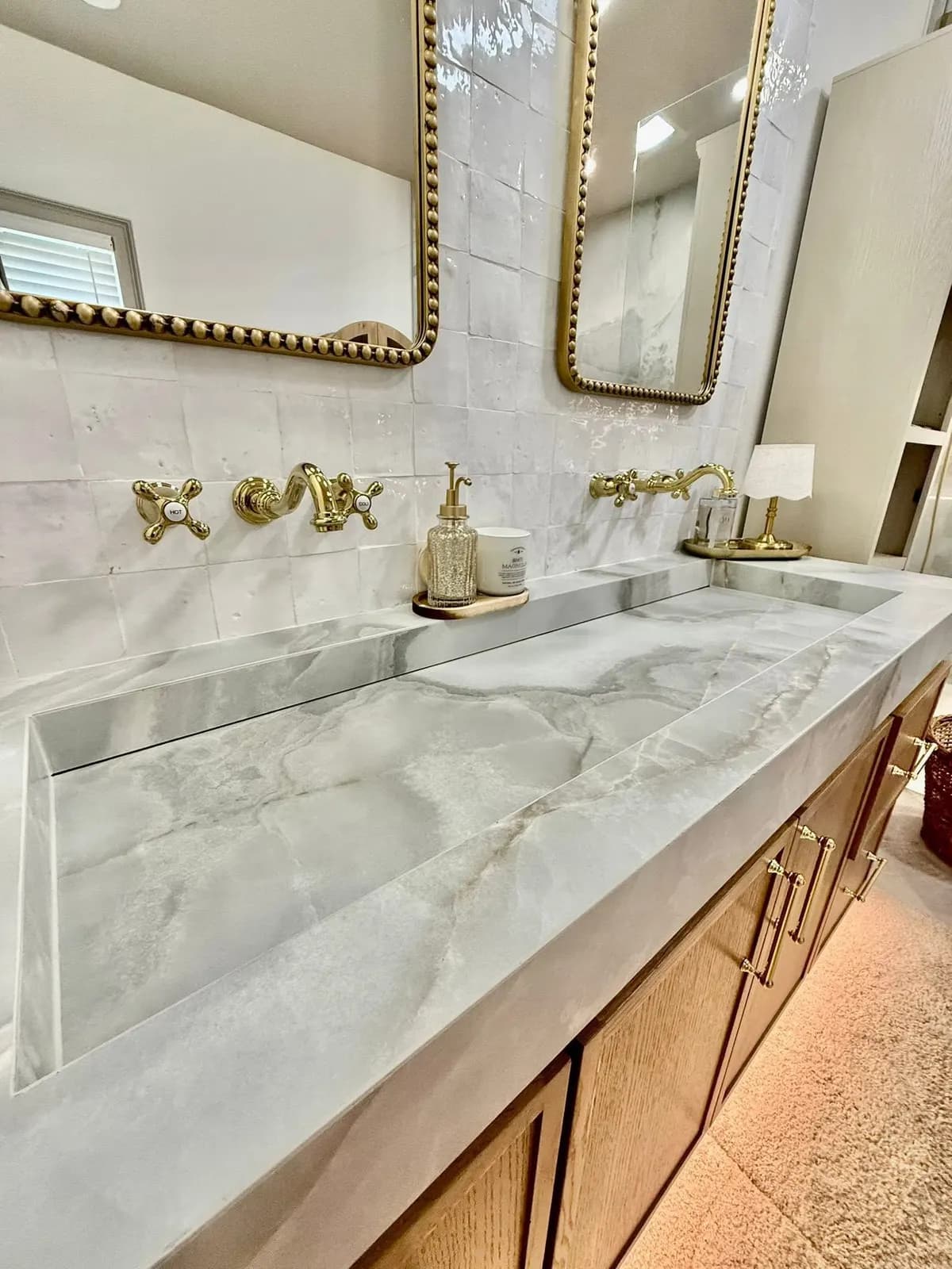 Wall-length marble trough sink